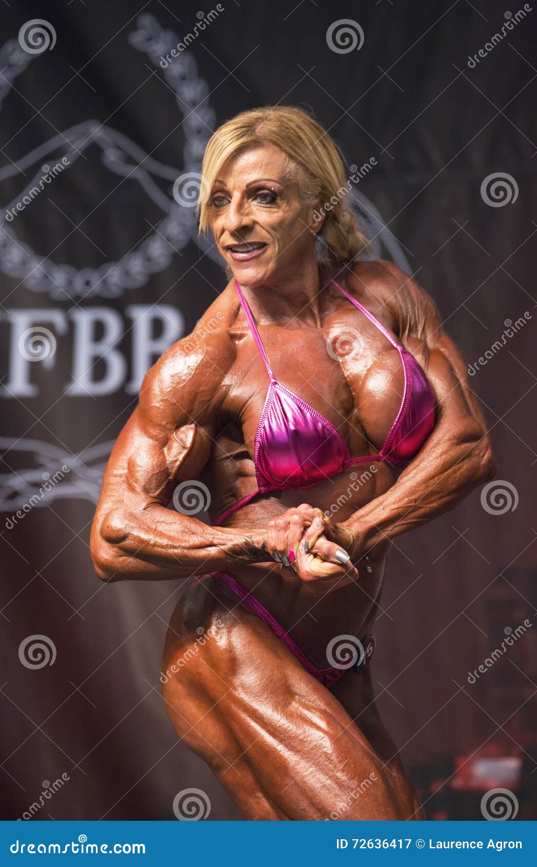 Champion Female Bodybuilder Displays Form Editorial Photography - Image of  busty, pose: 72636417