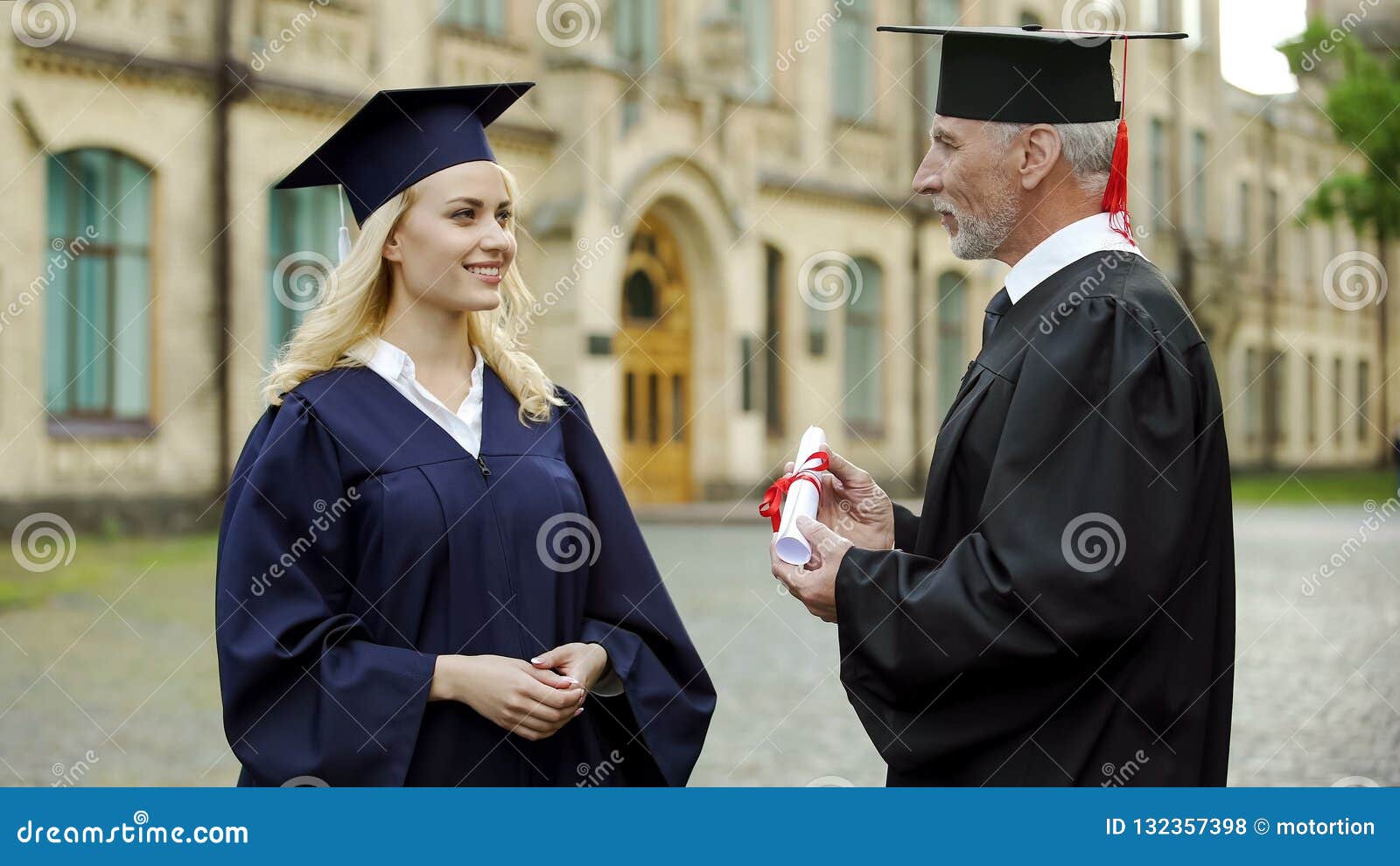 chancellor of university giving diploma to graduating student, successful future