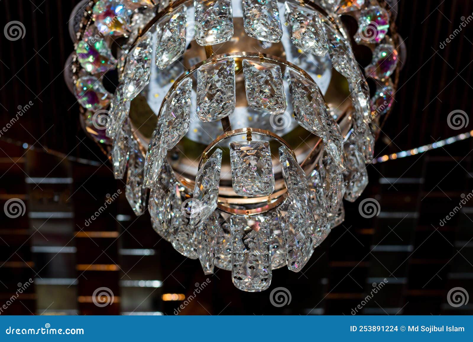 Chandeliers Cage Chandeliers Feature a Light Source Surrounded by Metal