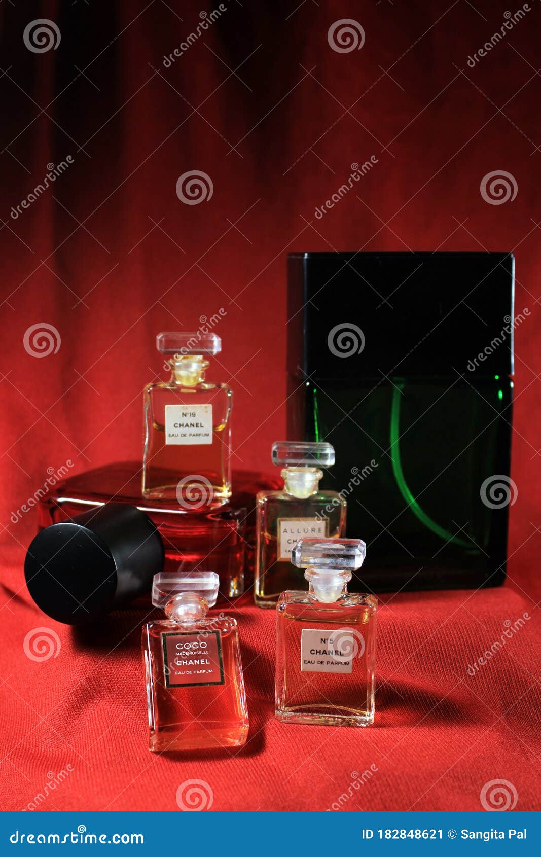 A Bottle Of Chanel Perfume On A Uniform Yellow Background, With A  Reflection Of The Lower Part. Allure Mens Perfume Series. 2020-07-05  Samara. Stock Photo, Picture and Royalty Free Image. Image 165011934.