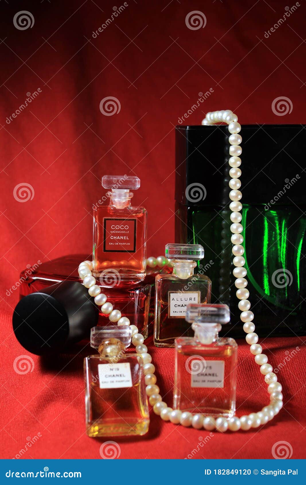 Chanel Perfume & Wild Stone Bottles Isolated on Black Background. Bottle  with Coco Chanel & N`5 Chanel Perfume Product Editorial Photo - Image of  famous, closeup: 182907946