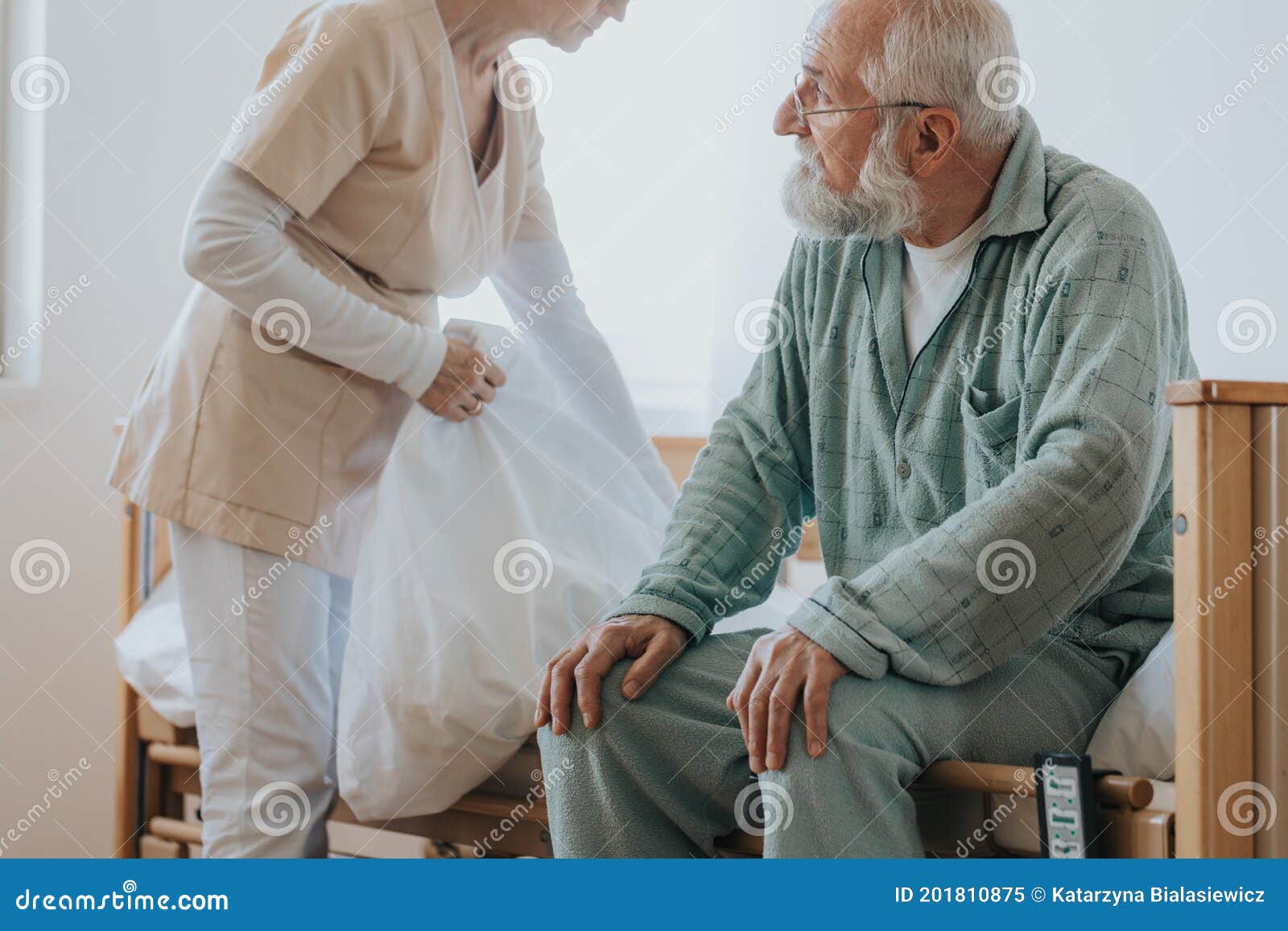 Changing the bedding stock image. Image of senior, retirement 201810875
