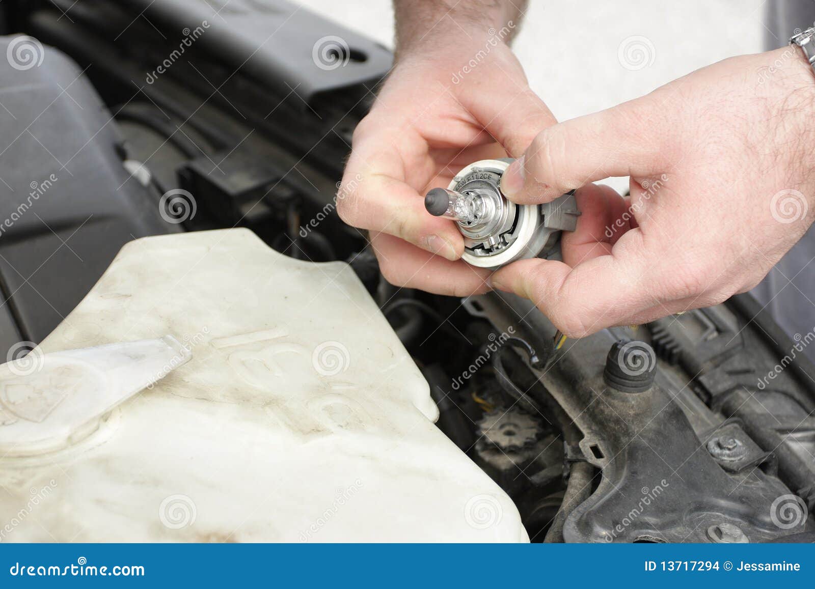 Changing car headlight stock photo. Image of bulb, body 13717294