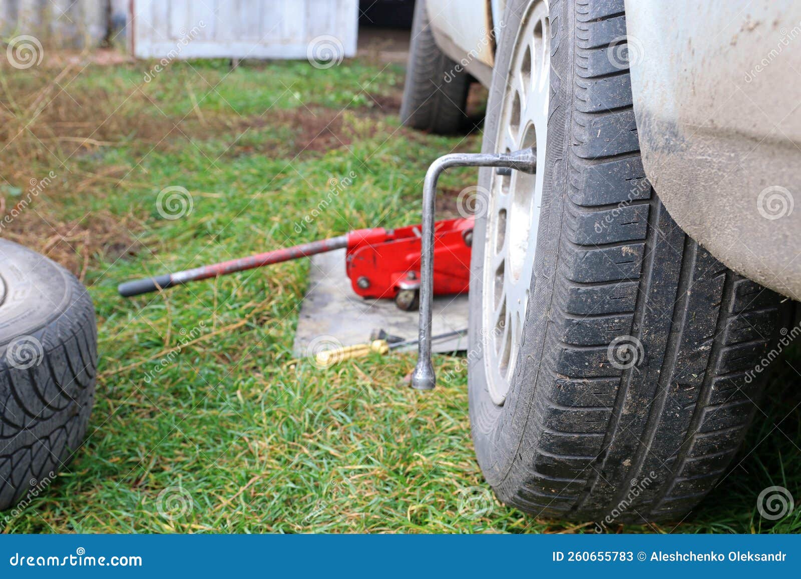 Changing Car Wheels. Replacement of Winter and Summer Tires. Stock