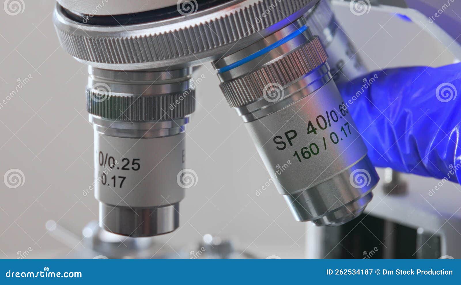 Changing the Magnification of Microscope. Stock Video Video of