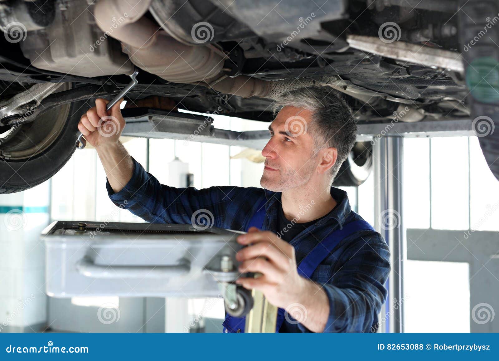 Changing the Oil in the Car Services Stock Photo Image of suspension