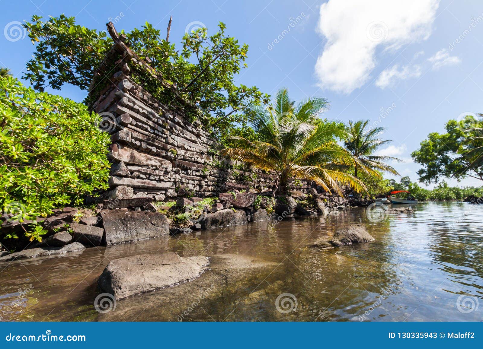 a channel and town walls in nan madol - prehistoric ruined stone city. pohnpei, micronesia, oceania.