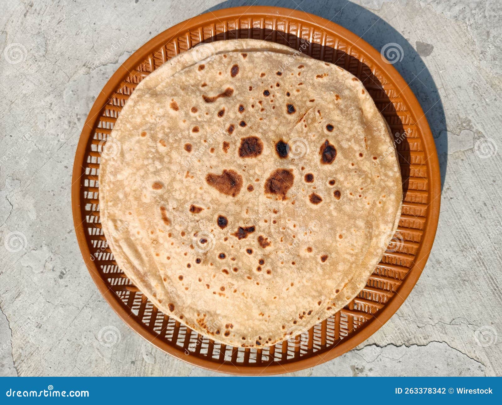 chapati, also known as roti, rotli, safati, shabaati, phulka, chapo, and roshi