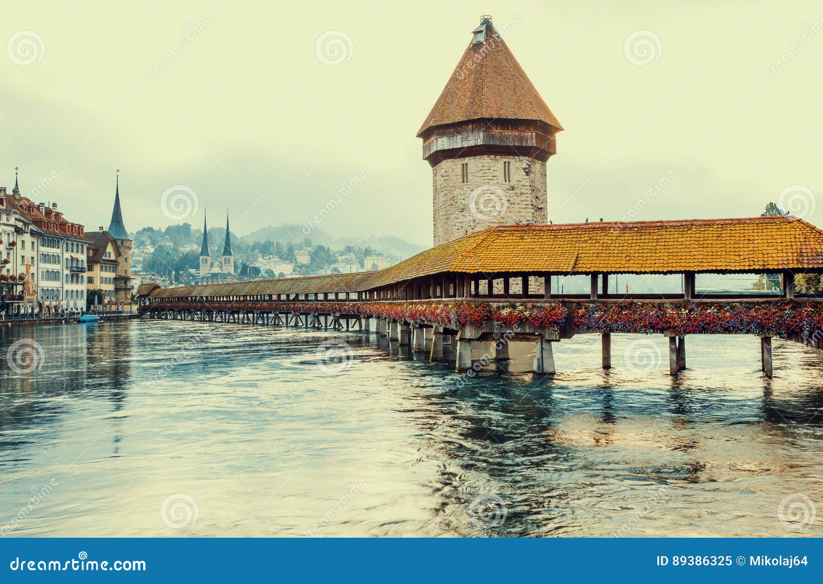 Chapel Bridge and Water Tower in Lucerne, Switzerland Editorial Image