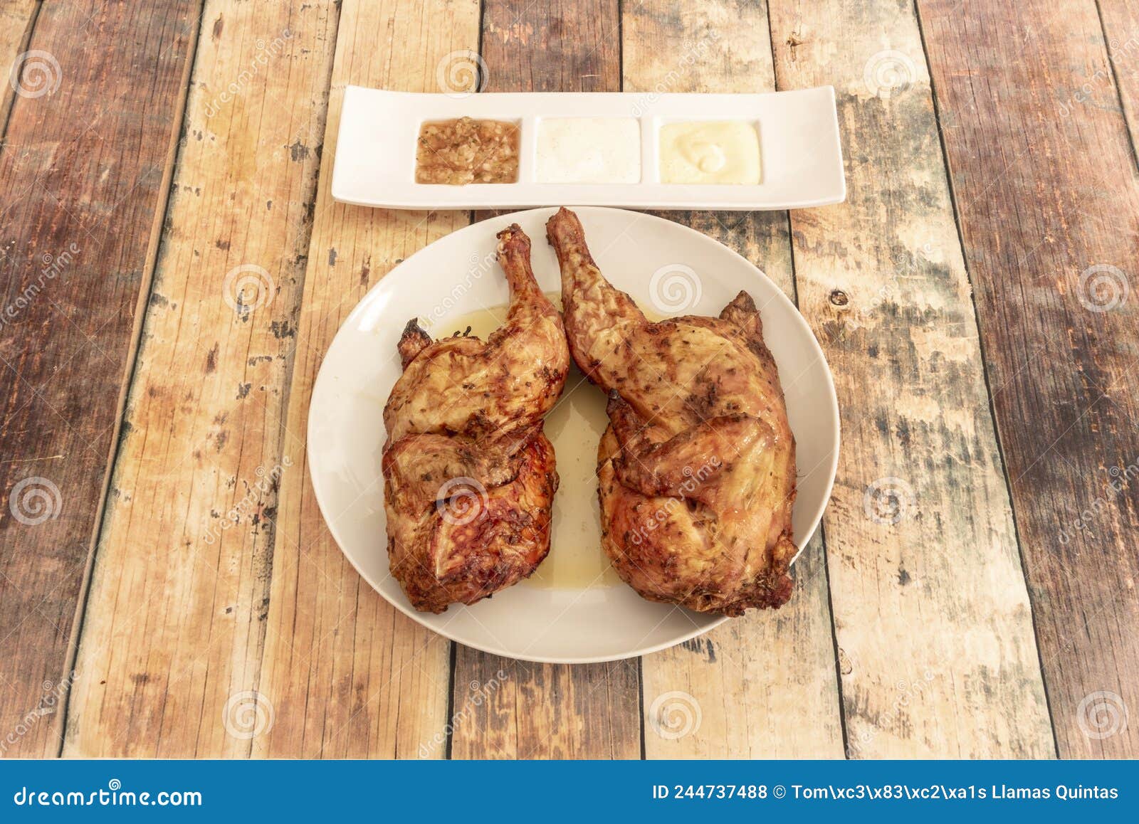 Charcoal Grilled Chicken Cut in Half with Sauces Stock Photo Image of