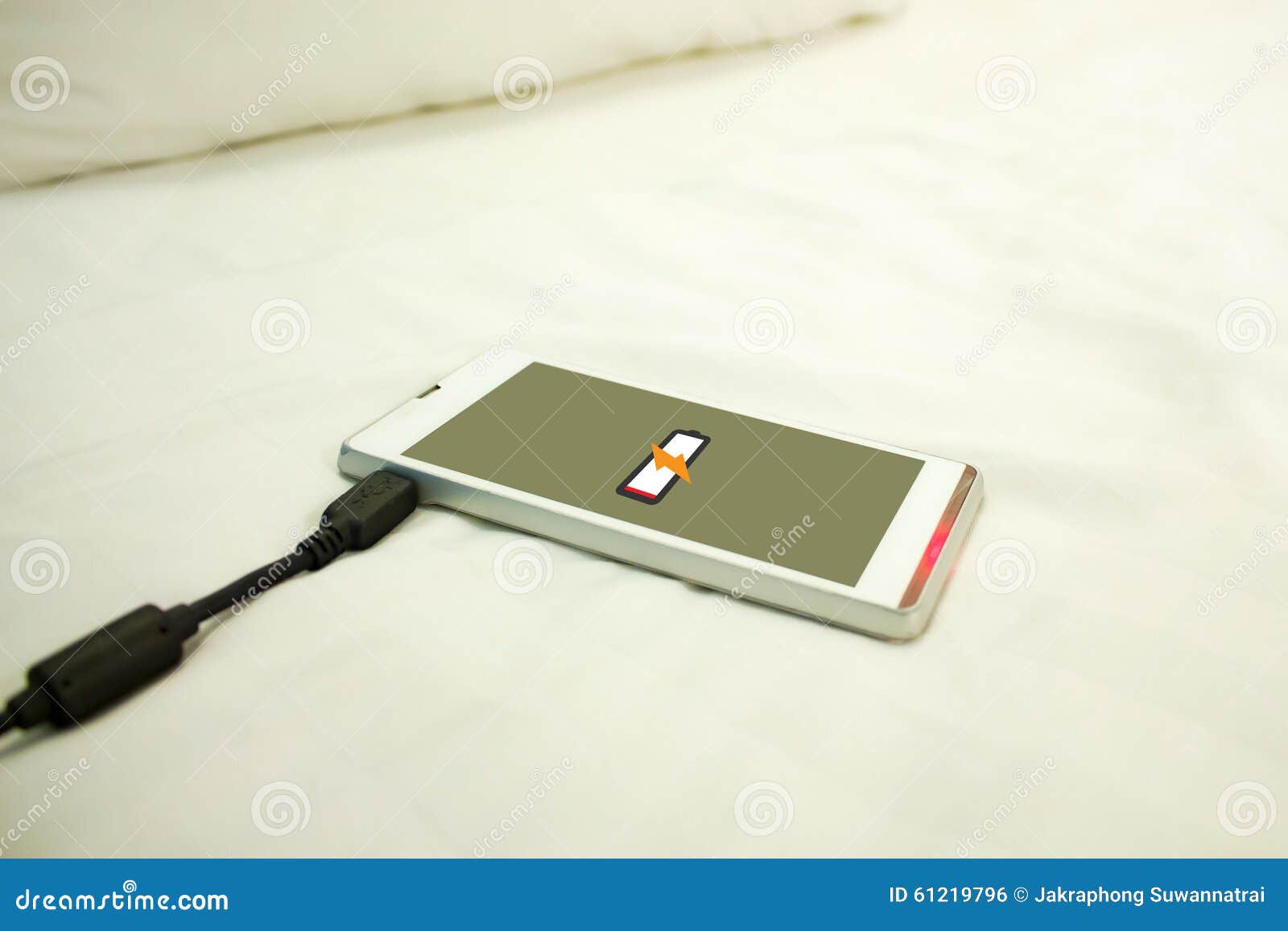 Charging Smart Phone on a Bed in Hotel Stock Photo Image of line