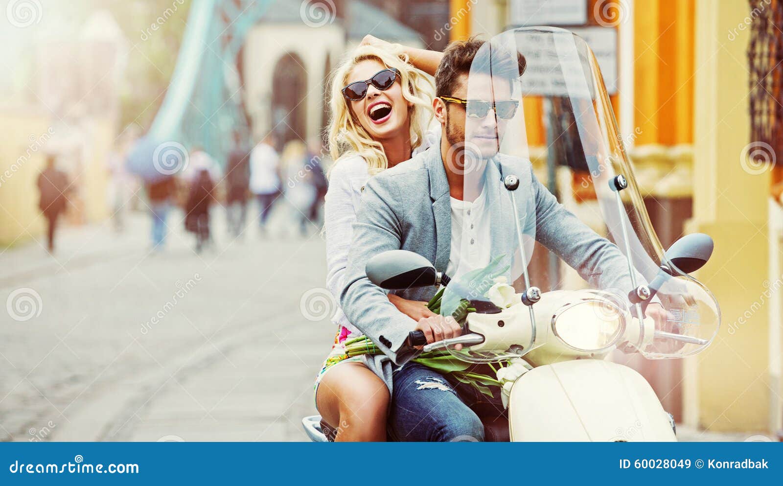 charimgn lady riding a retro scooter with her boyfriend
