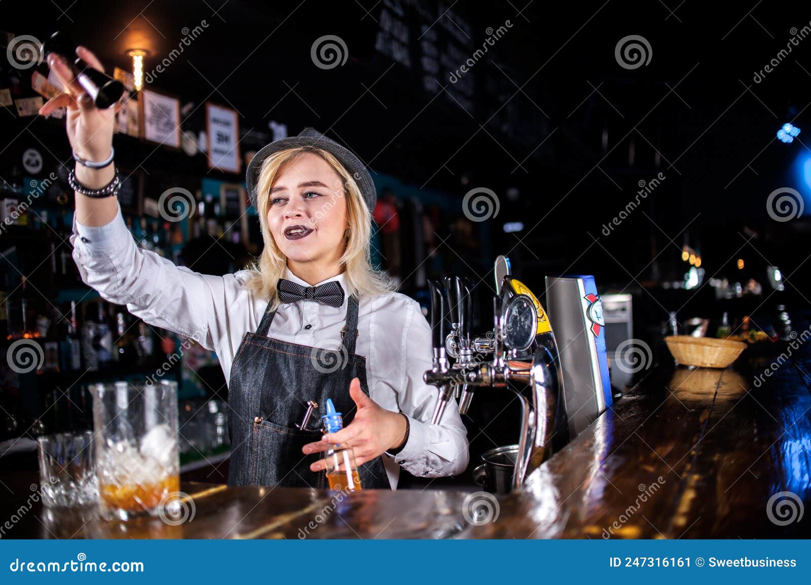 Charming Girl Bartending Creates a Cocktail at the Bar Counter Stock ...