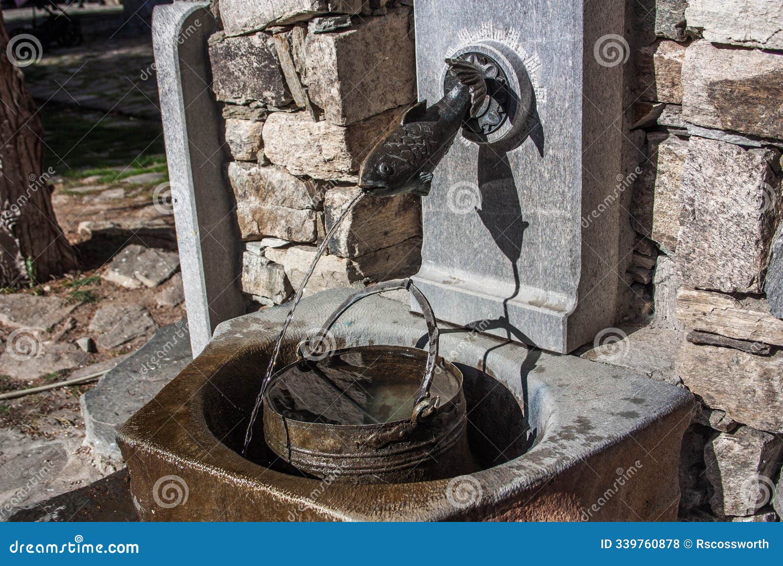 a splash of tradition: the fish fountain