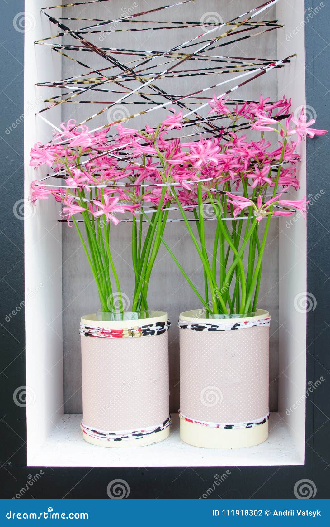 Charming Interior with Pots of Flowers in a Niche in the Wall Stock