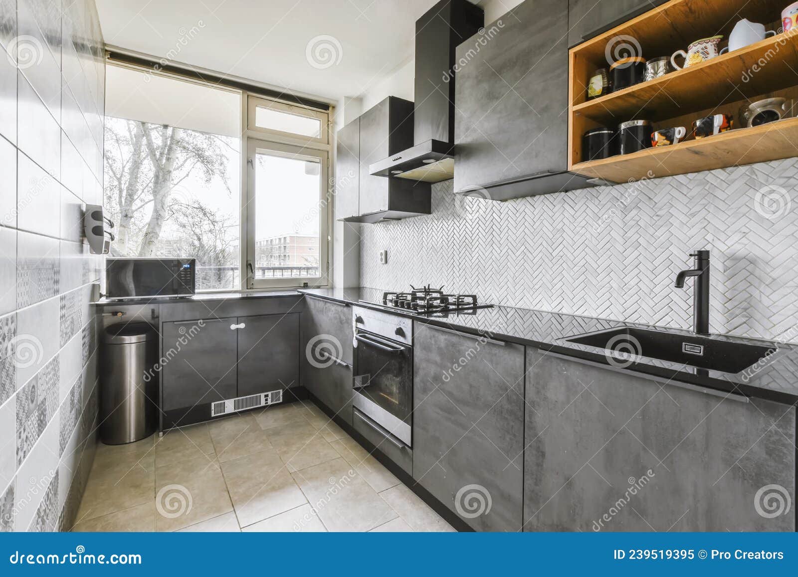 Charming Kitchen Area with a Black Kitchen Set Stock Image Image of