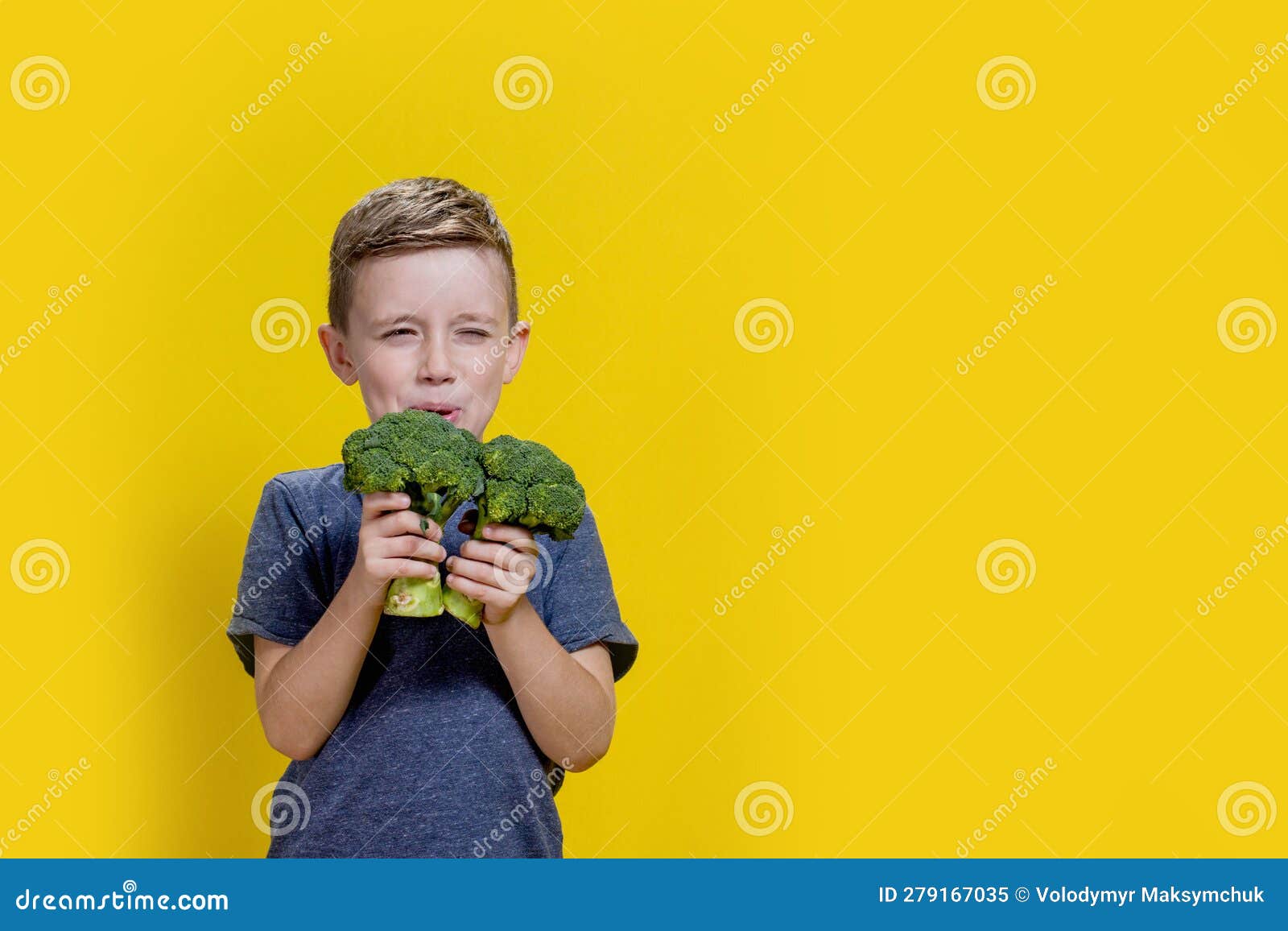 A Charming Little Boy Refusing To Eat Broccoli. Brootish Broccoli Stock