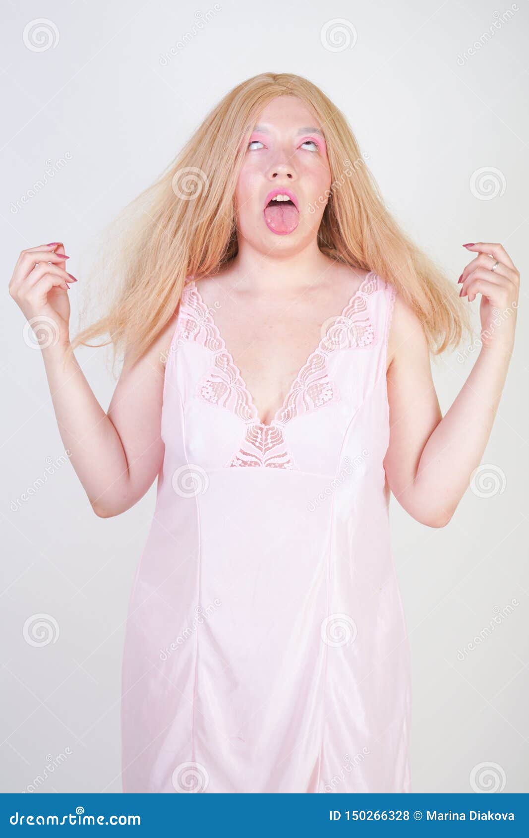 Charming Plus Size Blonde Asian Girl in Pink Pretty Silk Nightgown Standing  and Happy Posing on White Background in Studio Alone. Stock Photo - Image  of daydreaming, female: 150266328