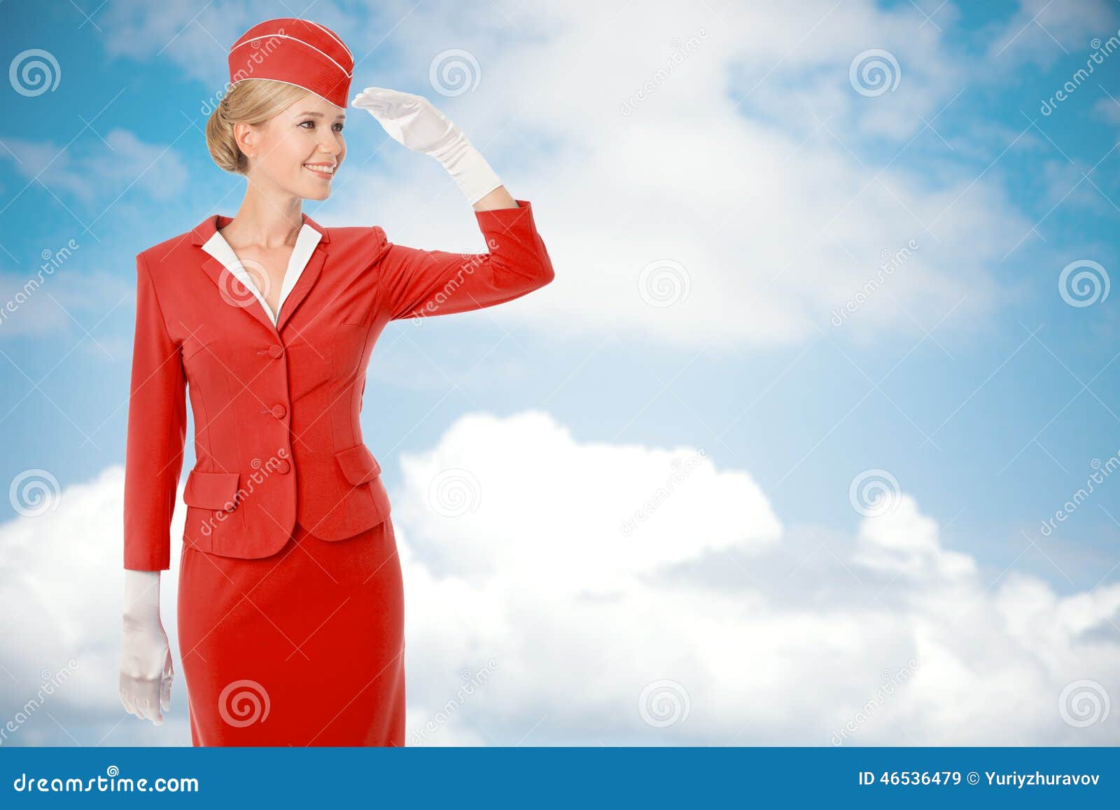 charming stewardess dressed in red uniform.