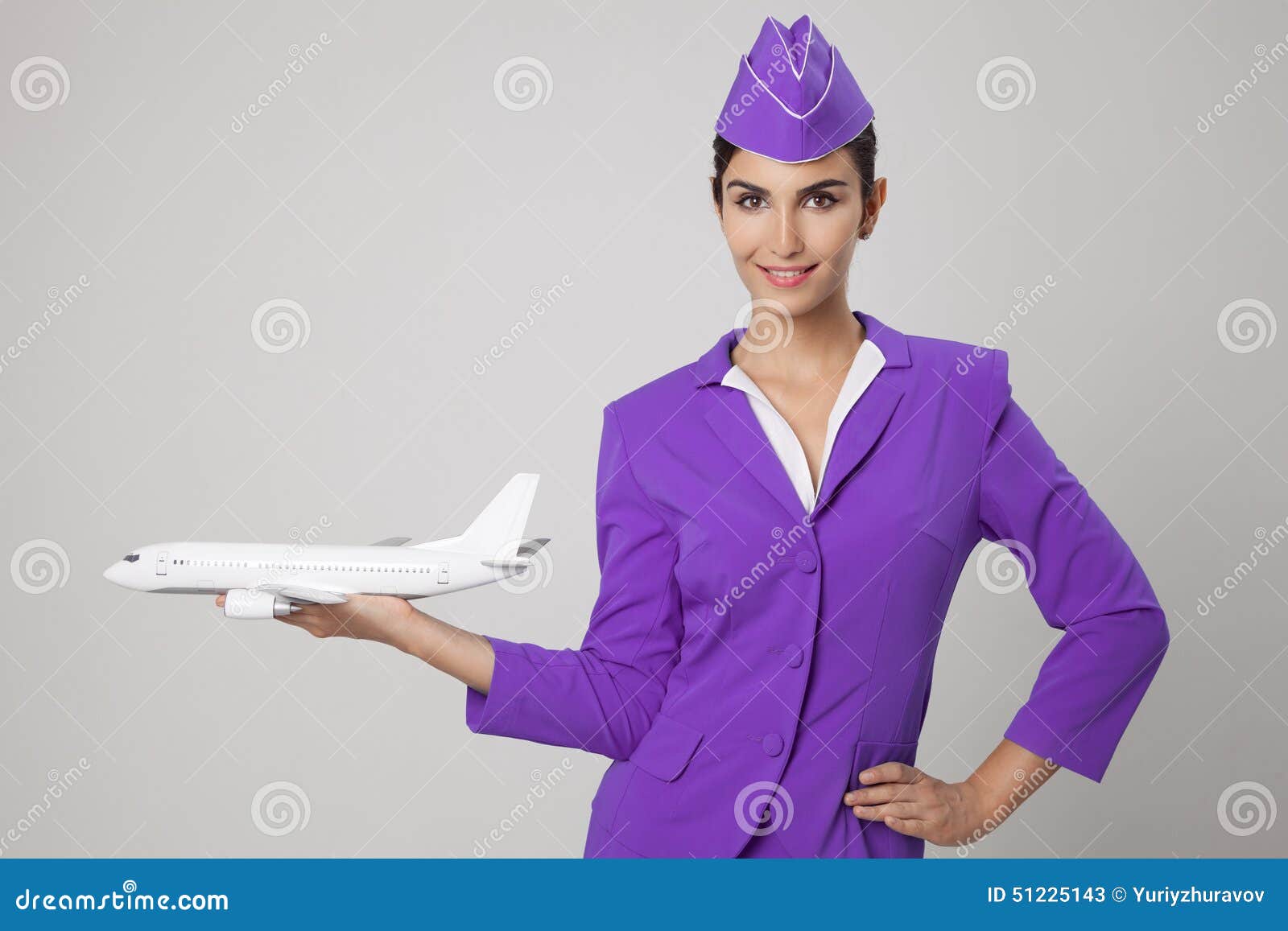 Charming Stewardess Holding Airplane in Hand. Stock Image Image of