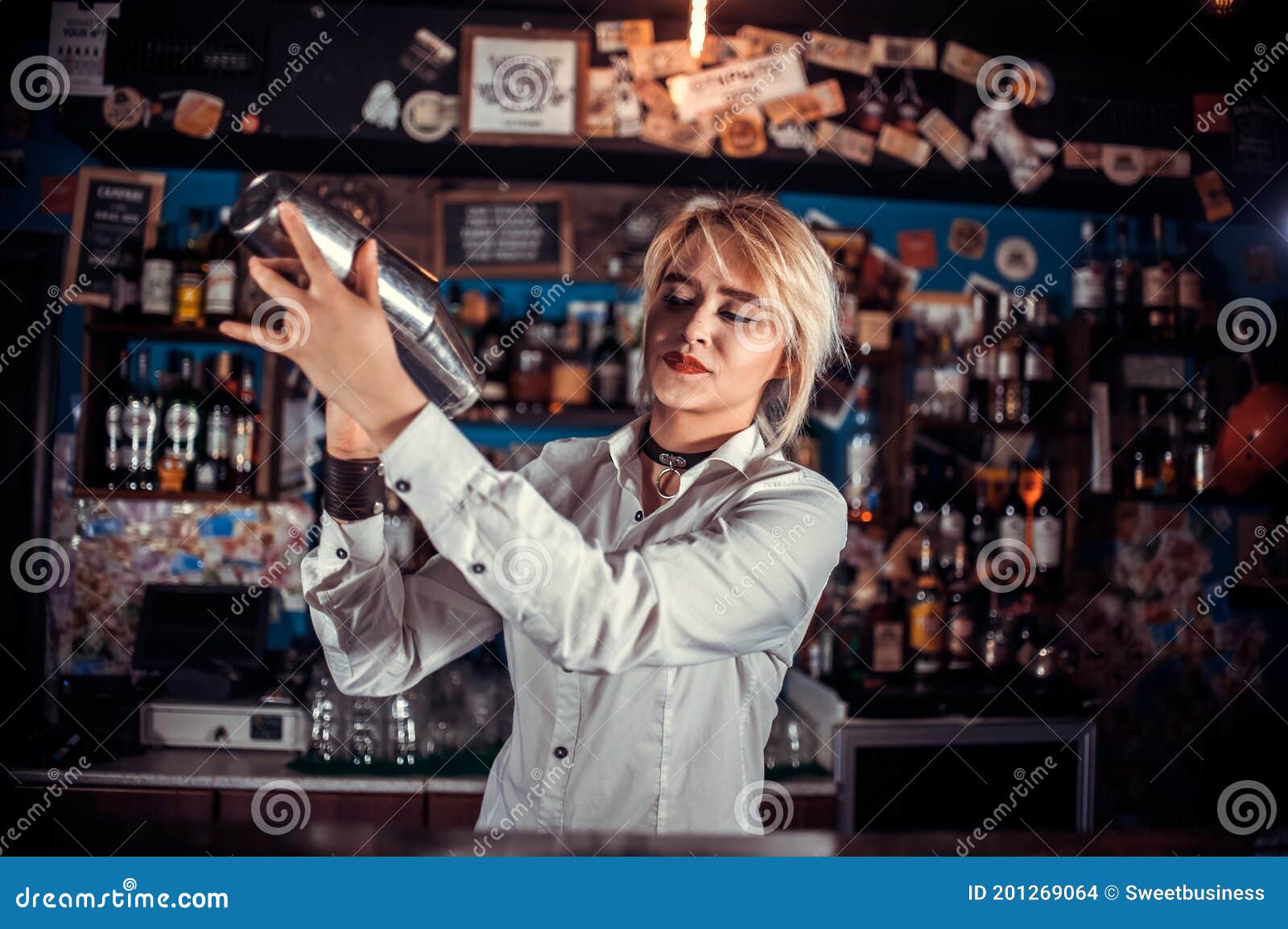 Focused Woman Bartender Intensely Finishes His Creation in Pub Stock ...