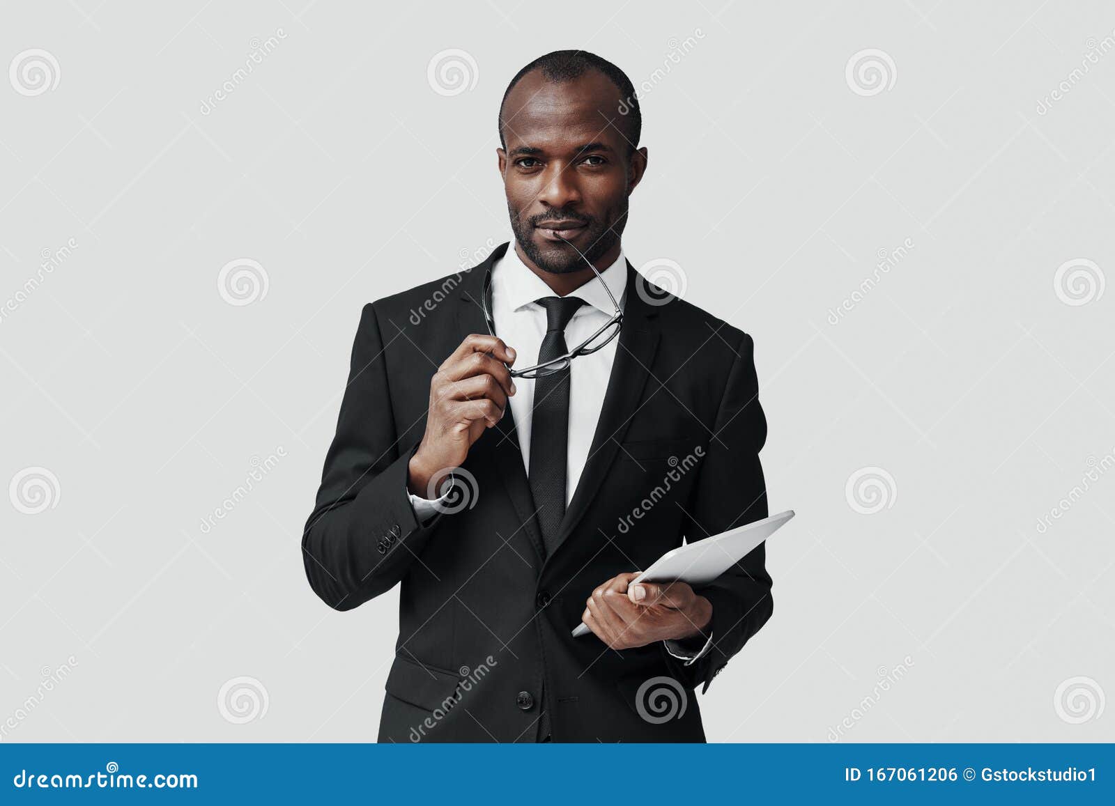 charming young african man in formalwear