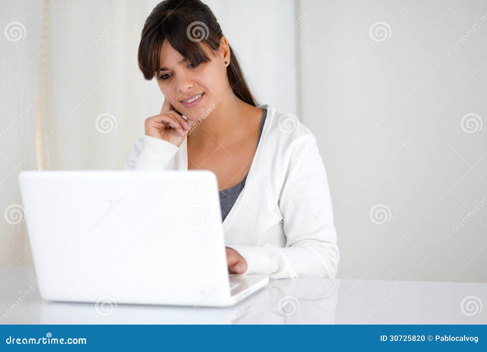 Charming Young Female Reading the Laptop Screen Stock Photo - Image of ...