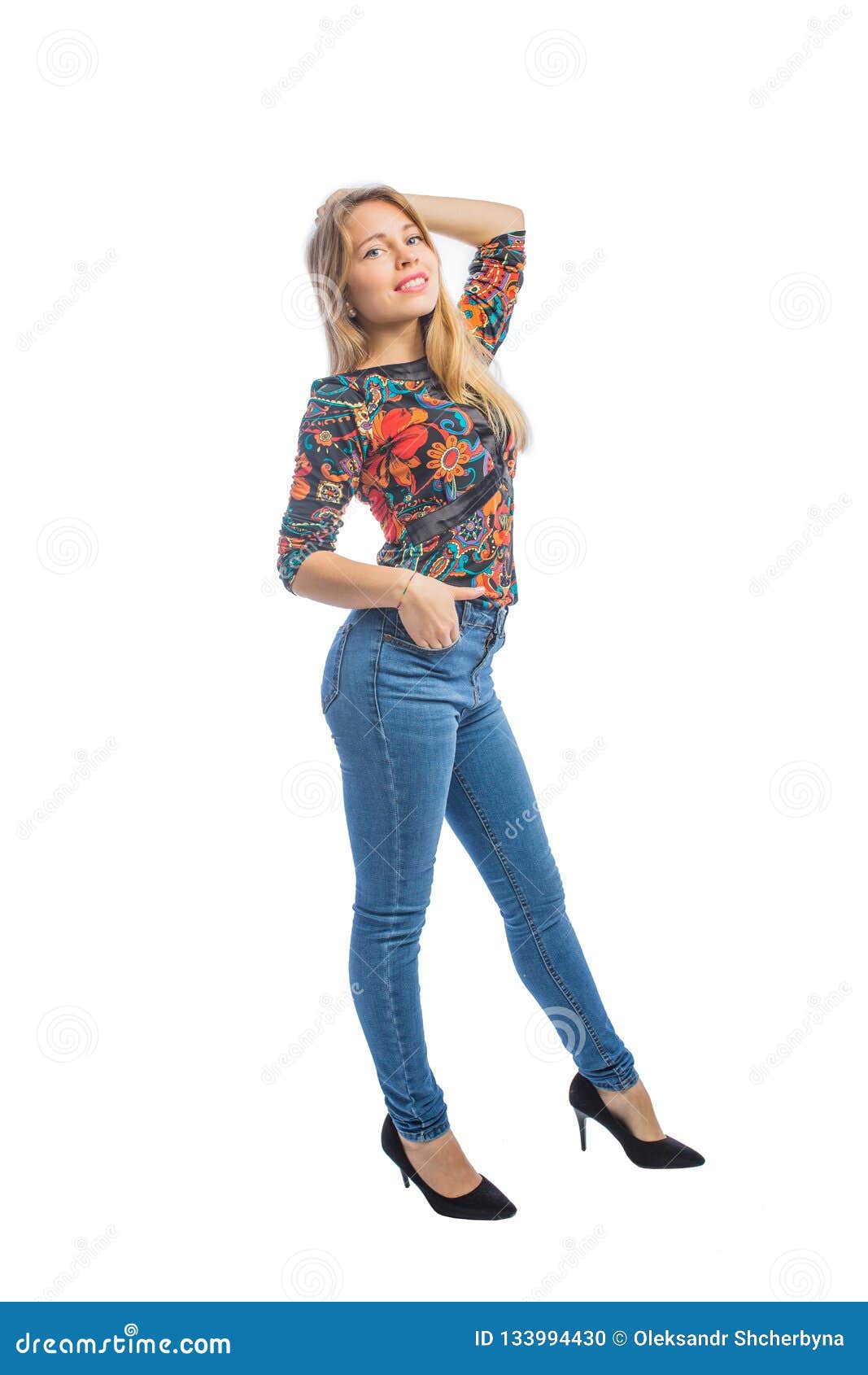 Charming Young Woman with Long Blond Hair in Jeans, a Blouse and Shoes ...