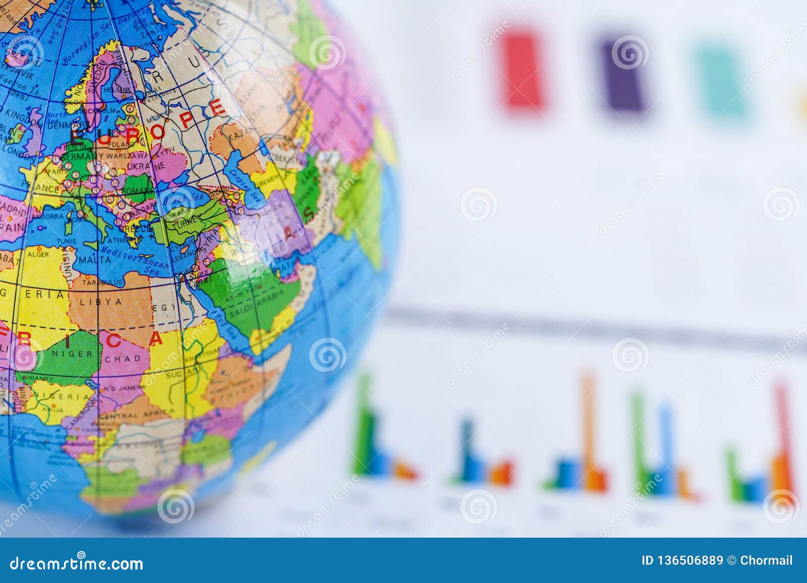 chart graph paper with globe world europe map on . finance, account, statistics, investment, analytic research data economy.