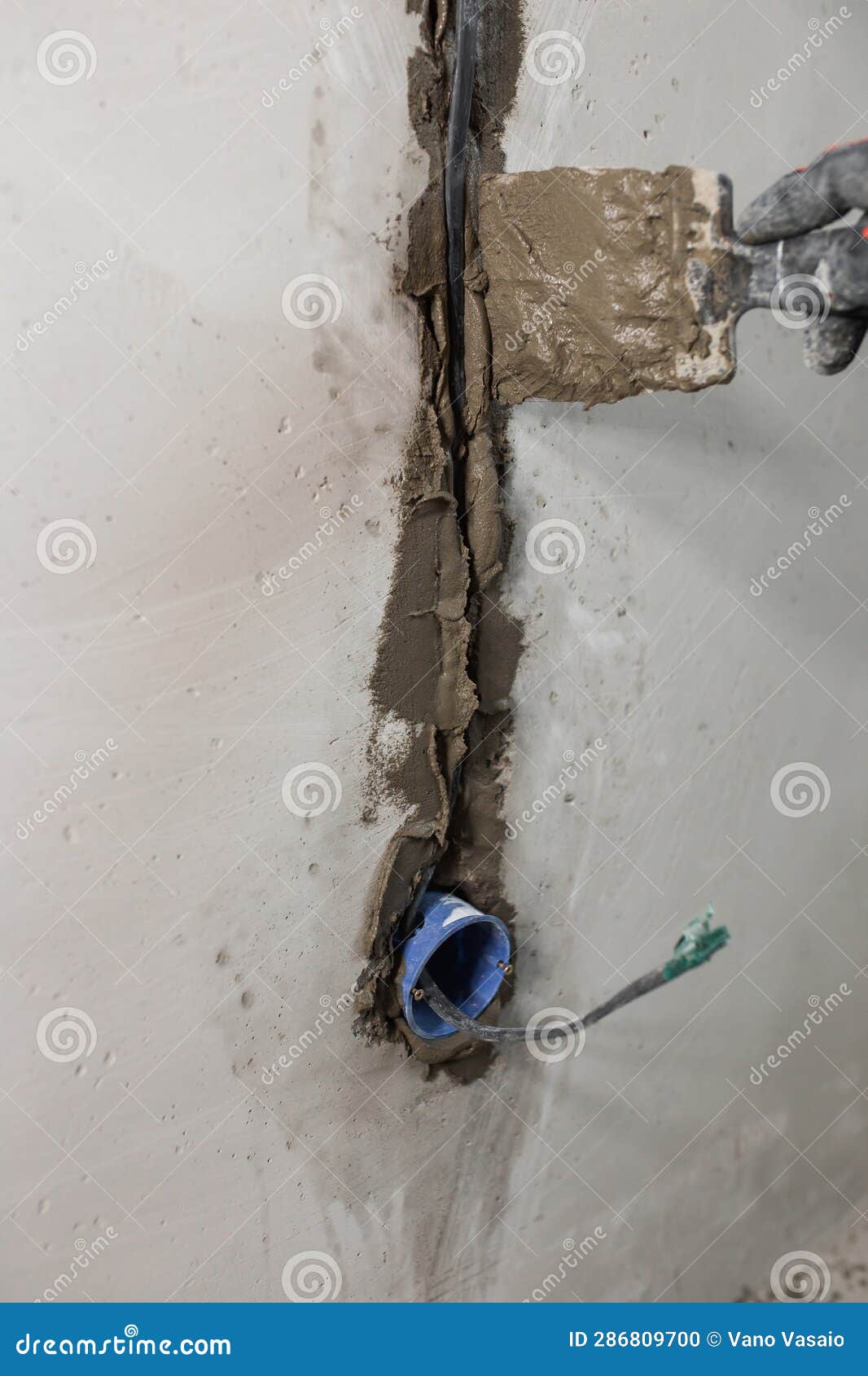 Chasing the Wall for the Installation of an Electrical Cable Stock