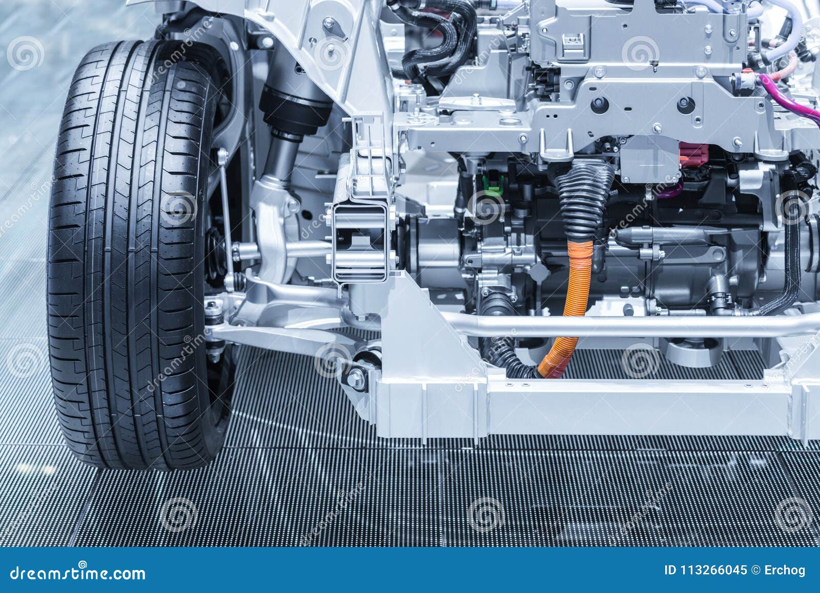 chassis of the electric, hybrid car with powertrain. car maintenance. blue toned.