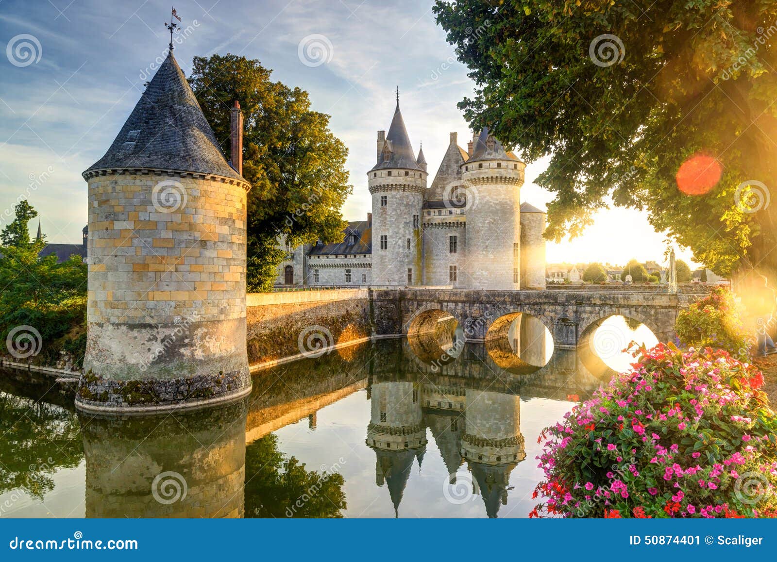 the chateau of sully-sur-loire in the sunlight with lens flare,