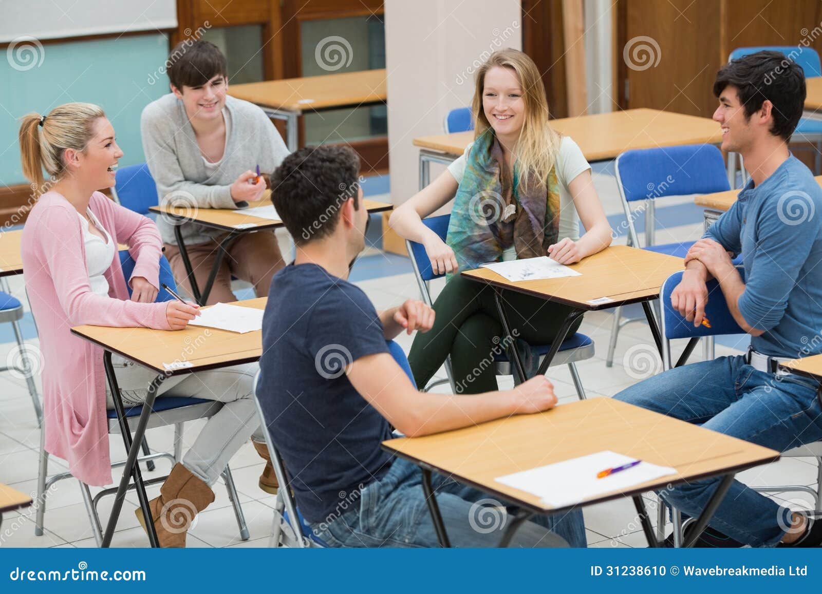 Chatting Students In The Classroom Stock Photo - Image of desk,  conversation: 31238610