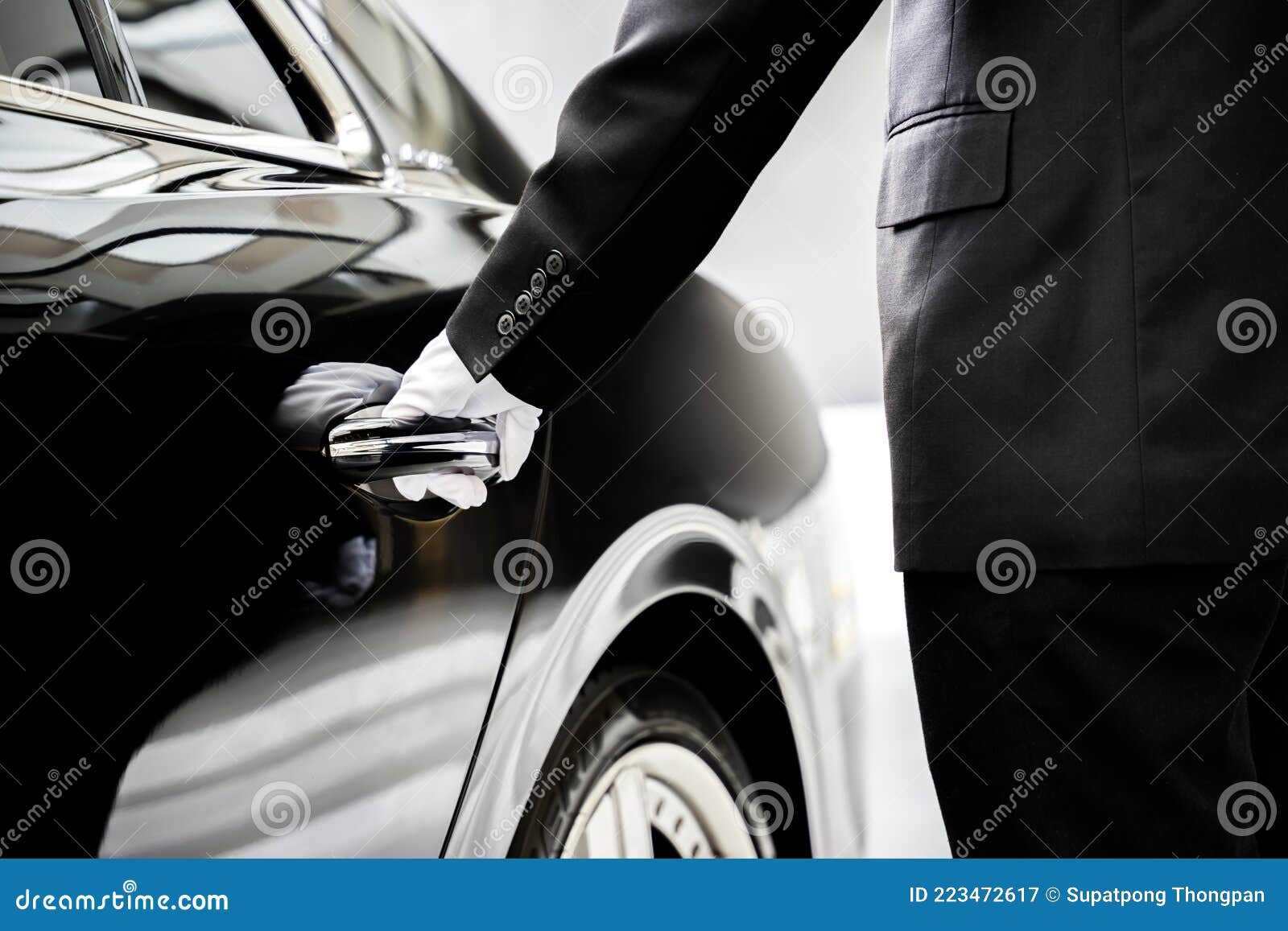 chauffeur opening car door