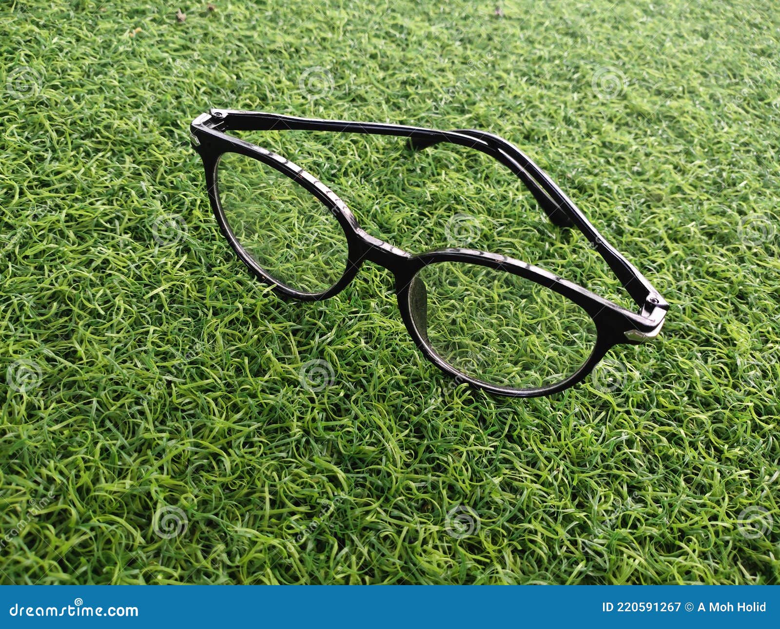 Cheap Glasses on Artificial Turf Stock Image - Image of grass, wheel ...