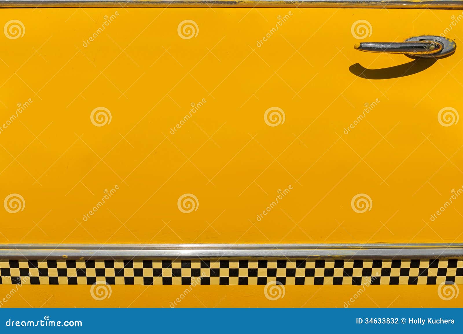 checkered yellow taxi cab door