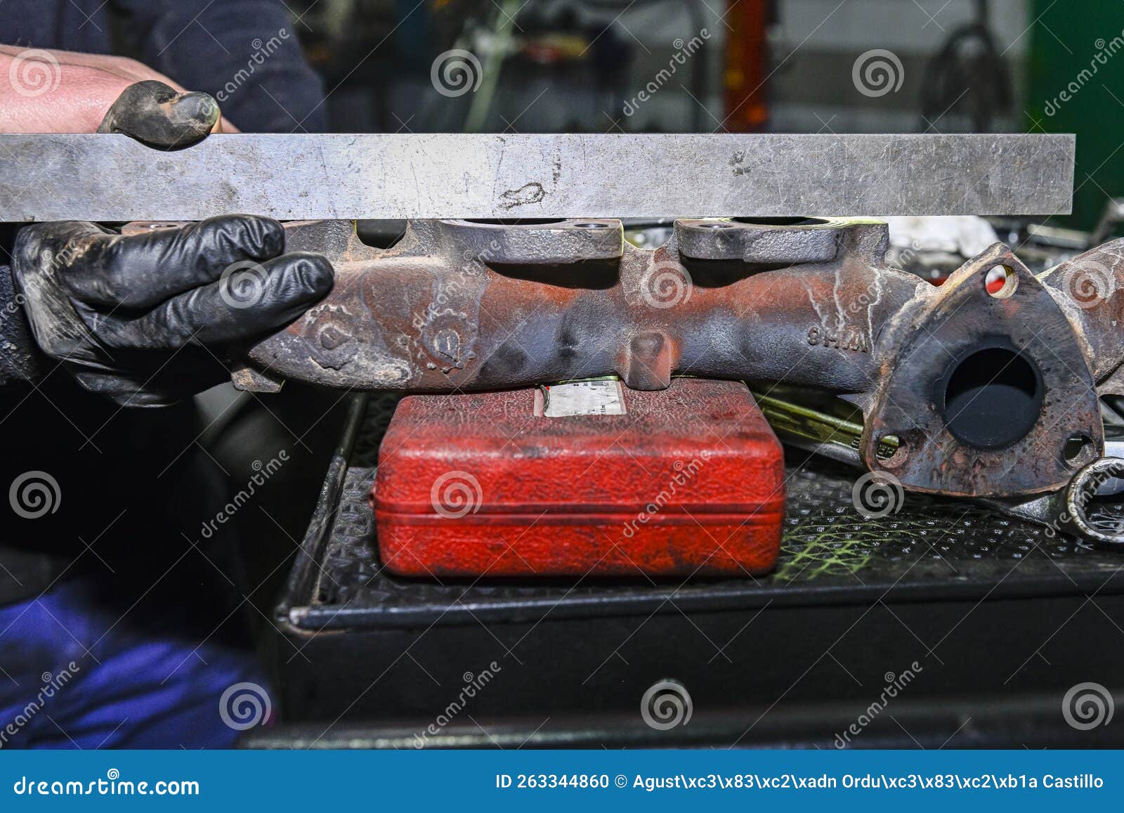 Checking the Alignment of the Exhaust Manifold of a Diesel Engine