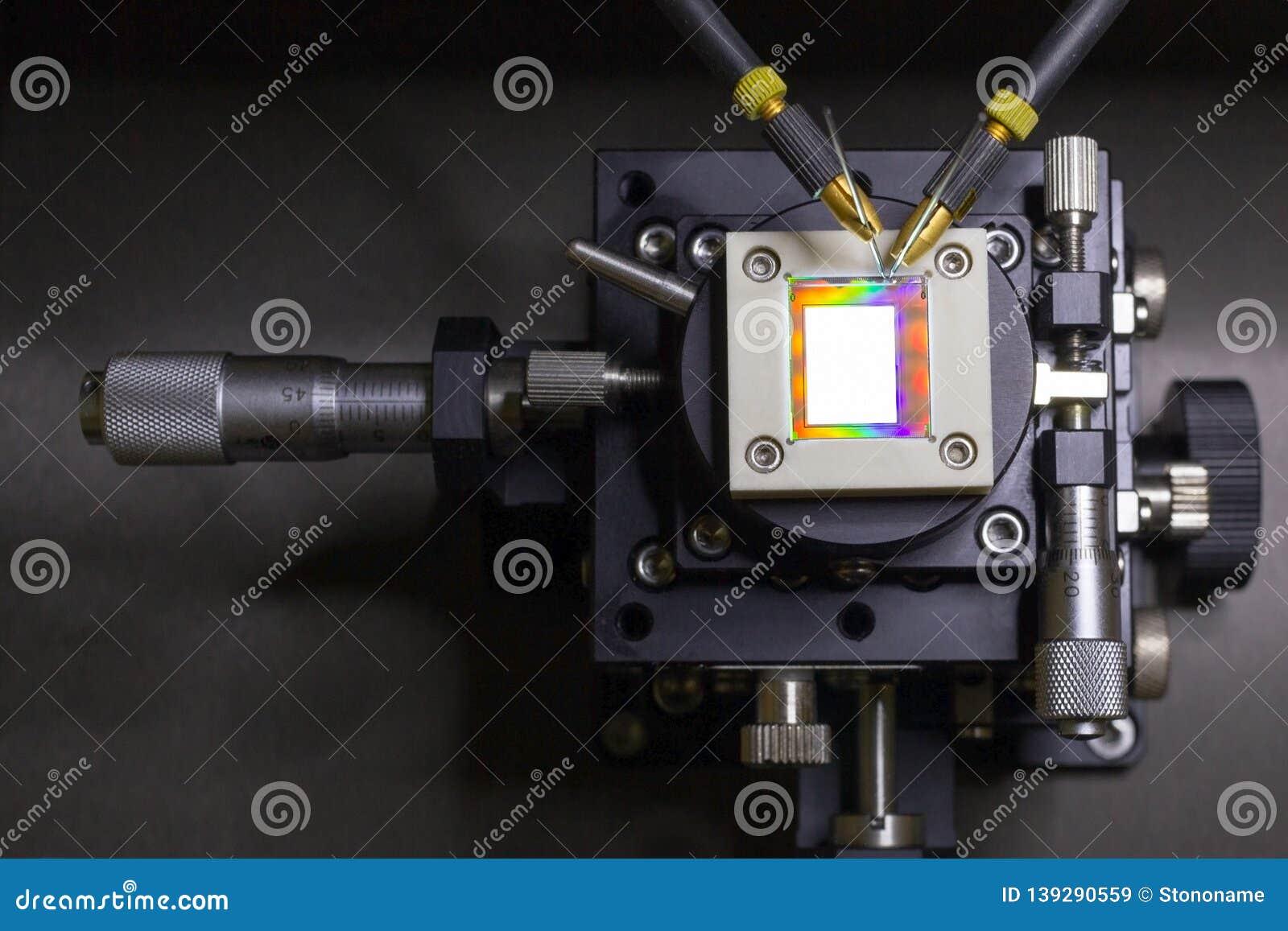 Checking turn on small oled display on a probe station stock image