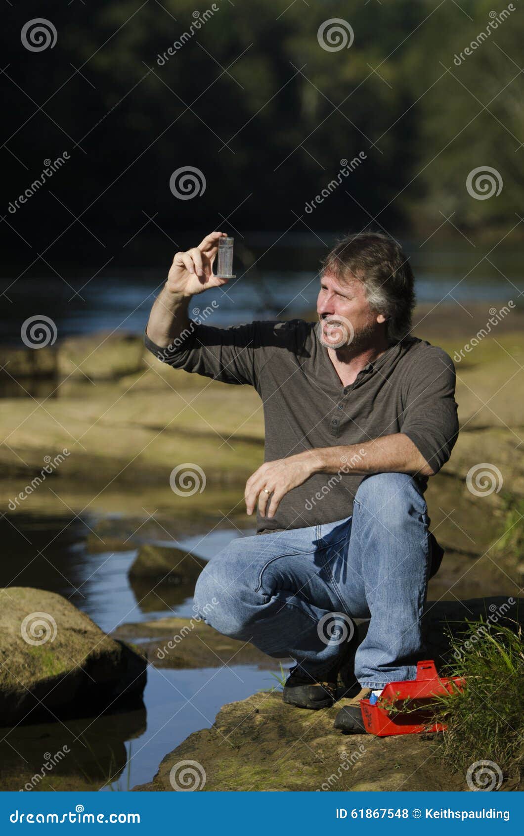 Checking water quality stock photo. Image of rocks, ecology - 61867548