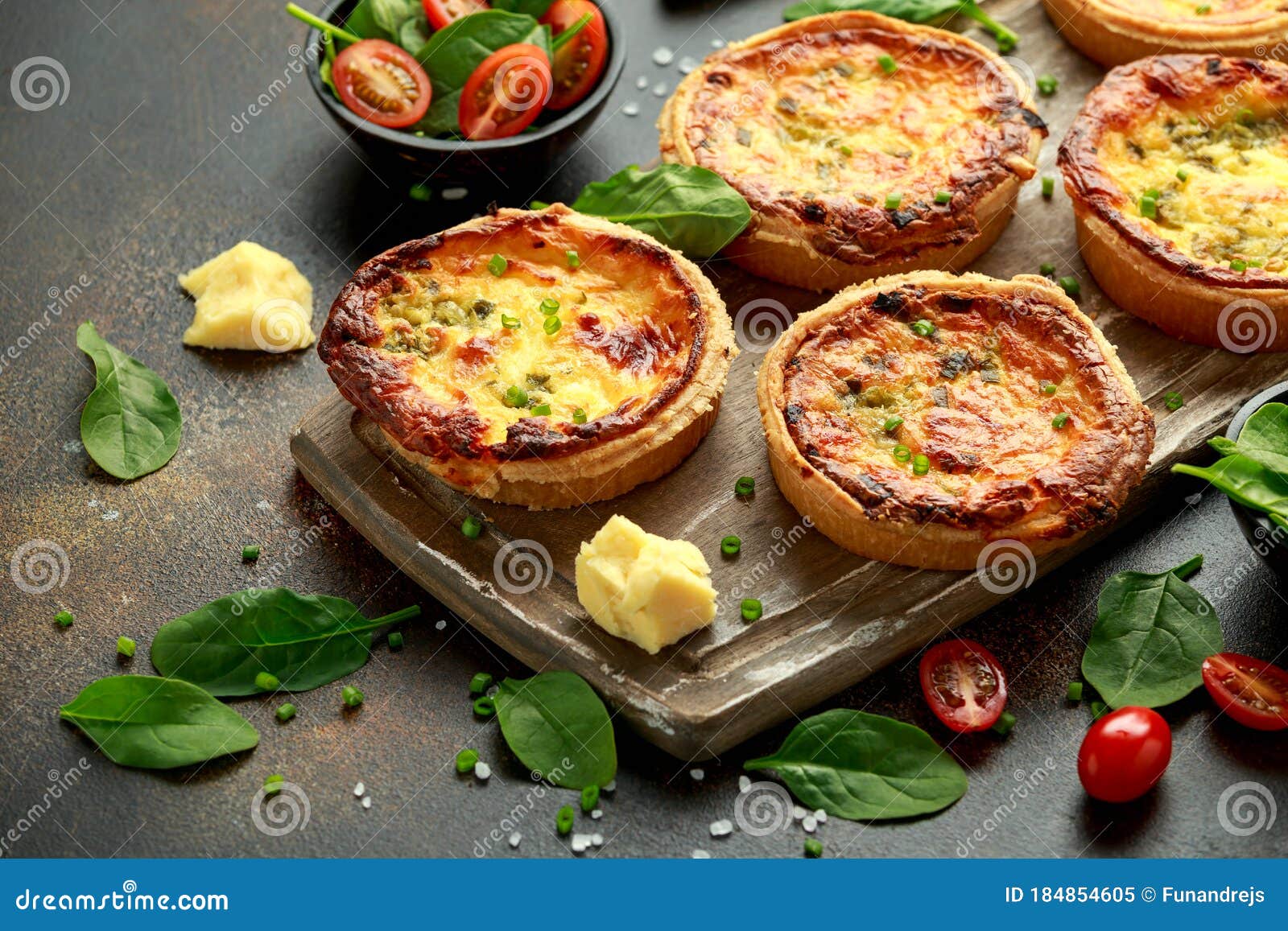 Cheddar Cheese and Spring Onion Omelette Tarts Served on Wooden Board ...