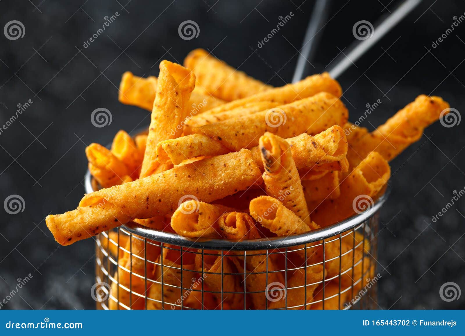 Cheddar Cheese Tortilla Rolls, Chips in Serving Basket Stock Photo