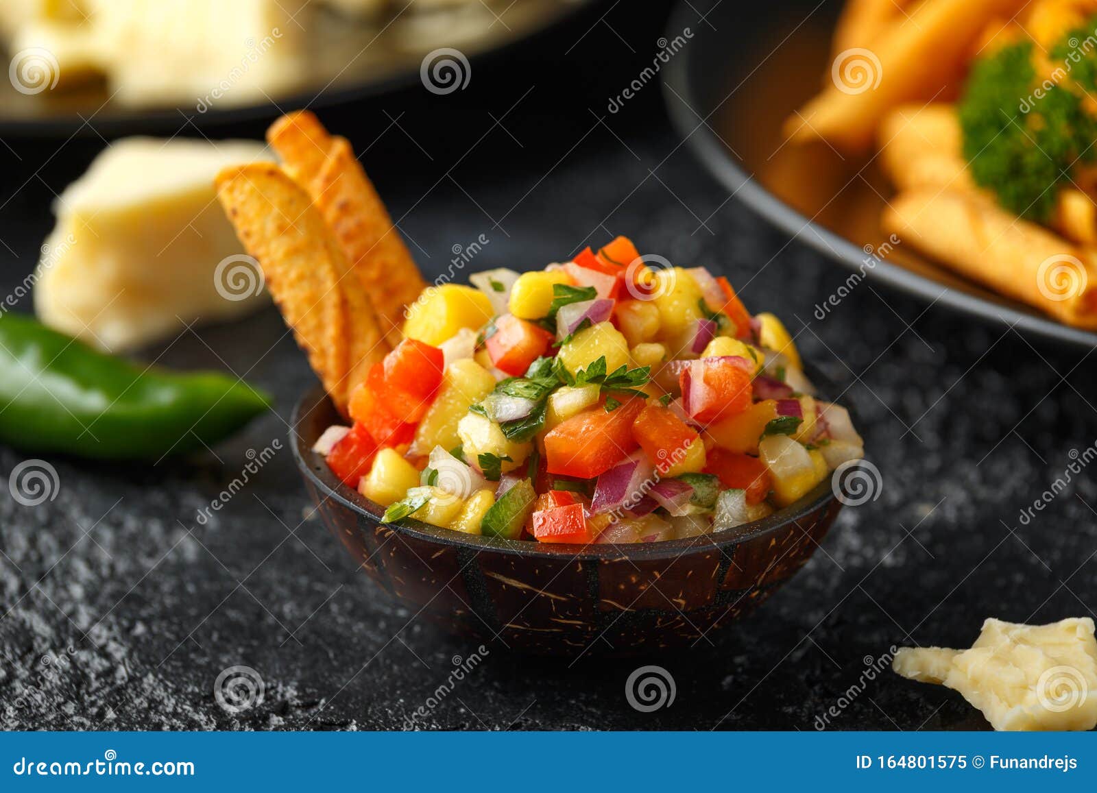 Cheddar Cheese Tortilla Rolls, Chips in Serving Basket with Mango Salsa