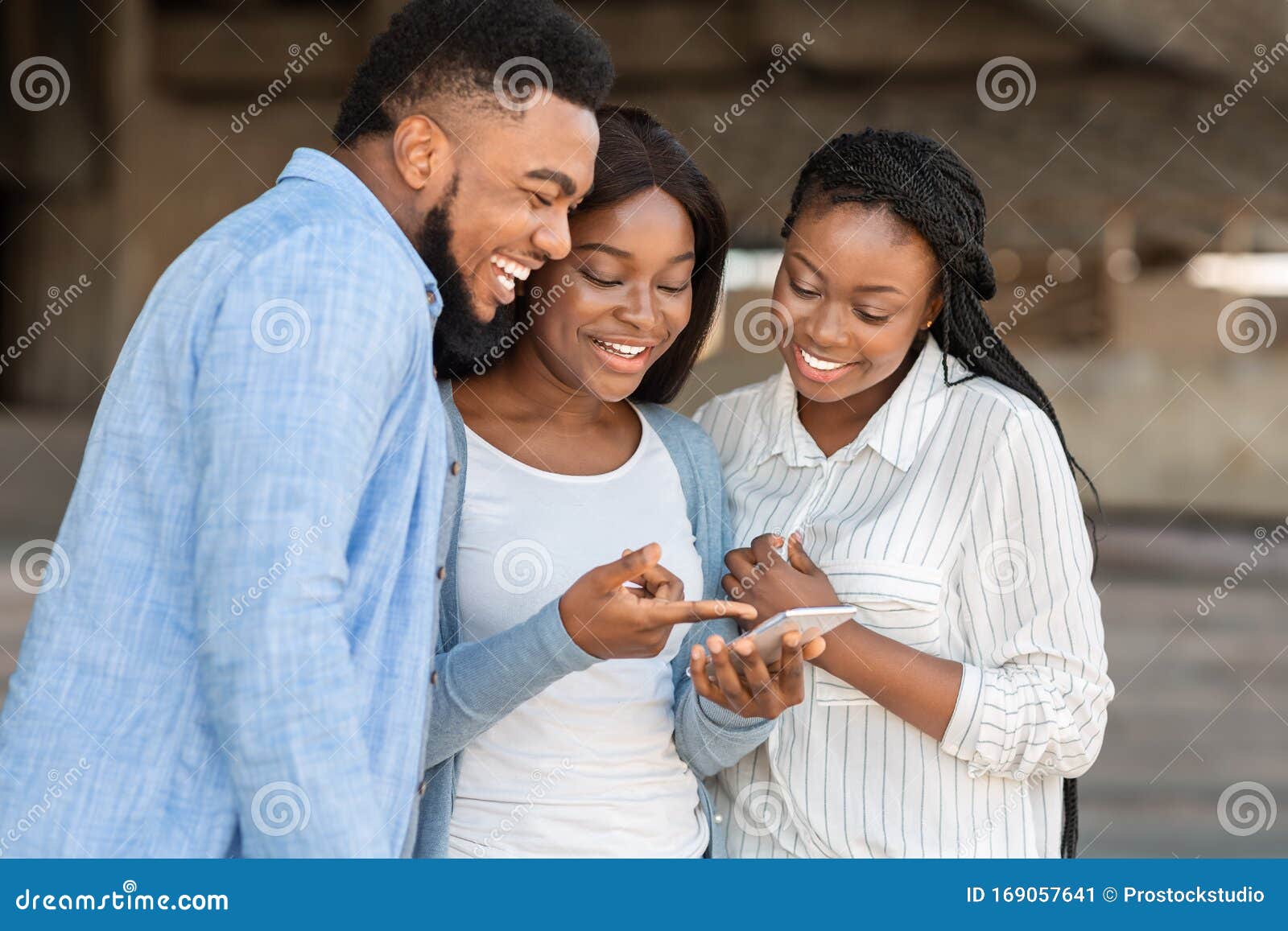 Cheerful African American Friends Watching Funny Videos on Smartphone Outdoors Stock Image - Image of group, online: 169057641 Cheerful African American Friends Watching Funny Videos on Smartphone Outdoors Stock Image - Image of group, online: 169057641