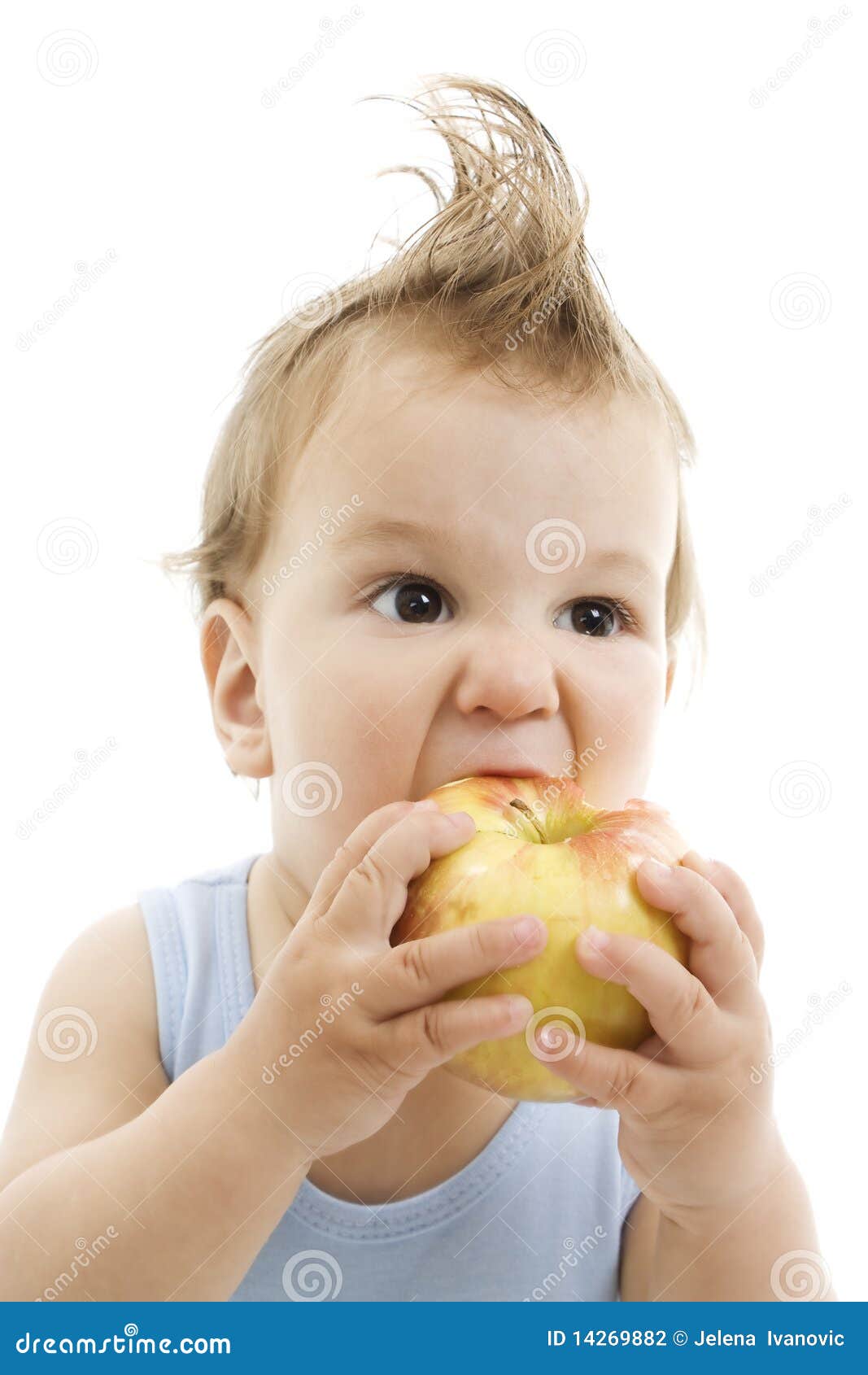 Cheerful baby eating apple stock photo. Image of fruit 14269882