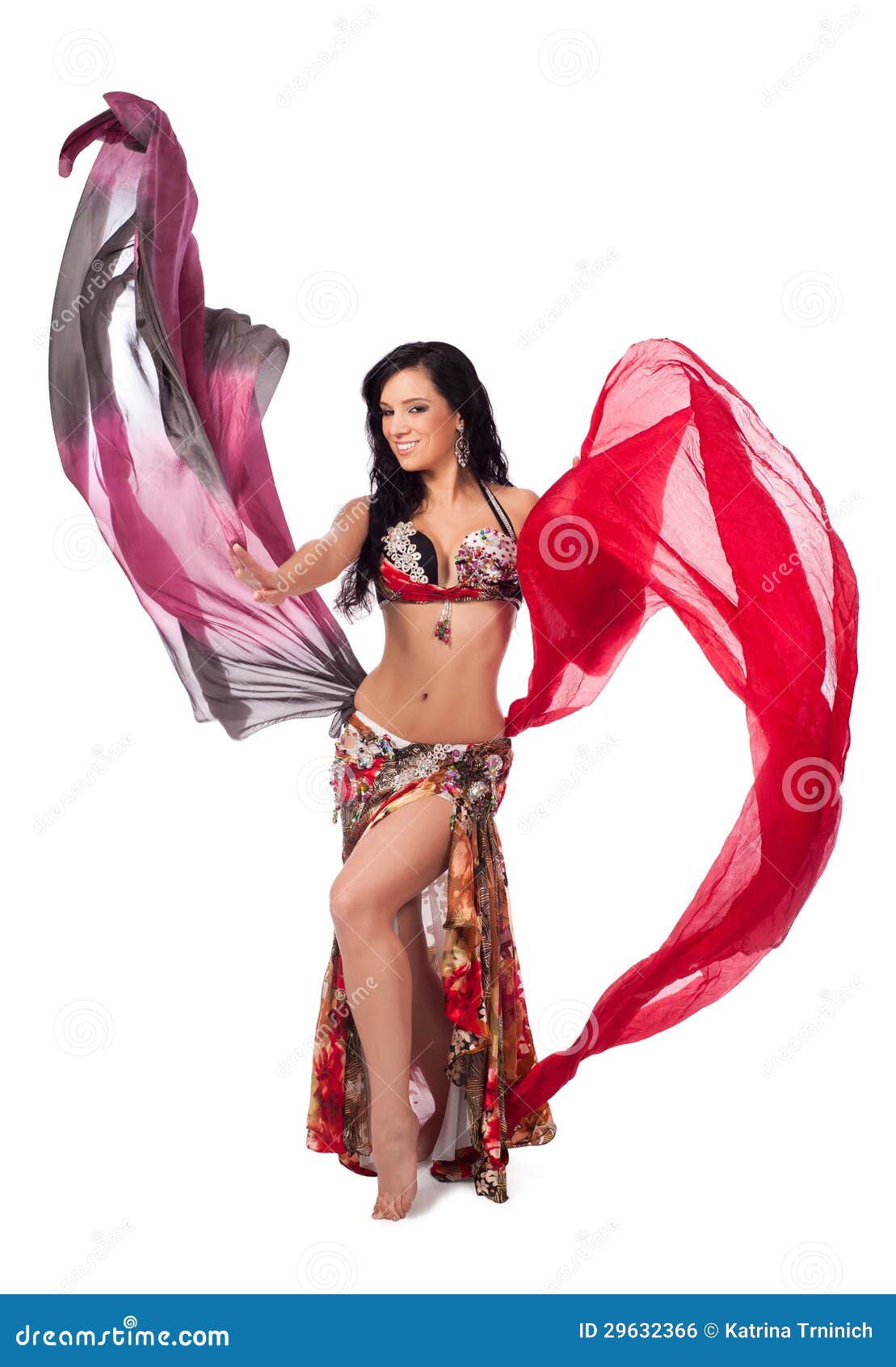 Cheerful Belly Dancer Dancing with Multicolored Veils Stock Photo