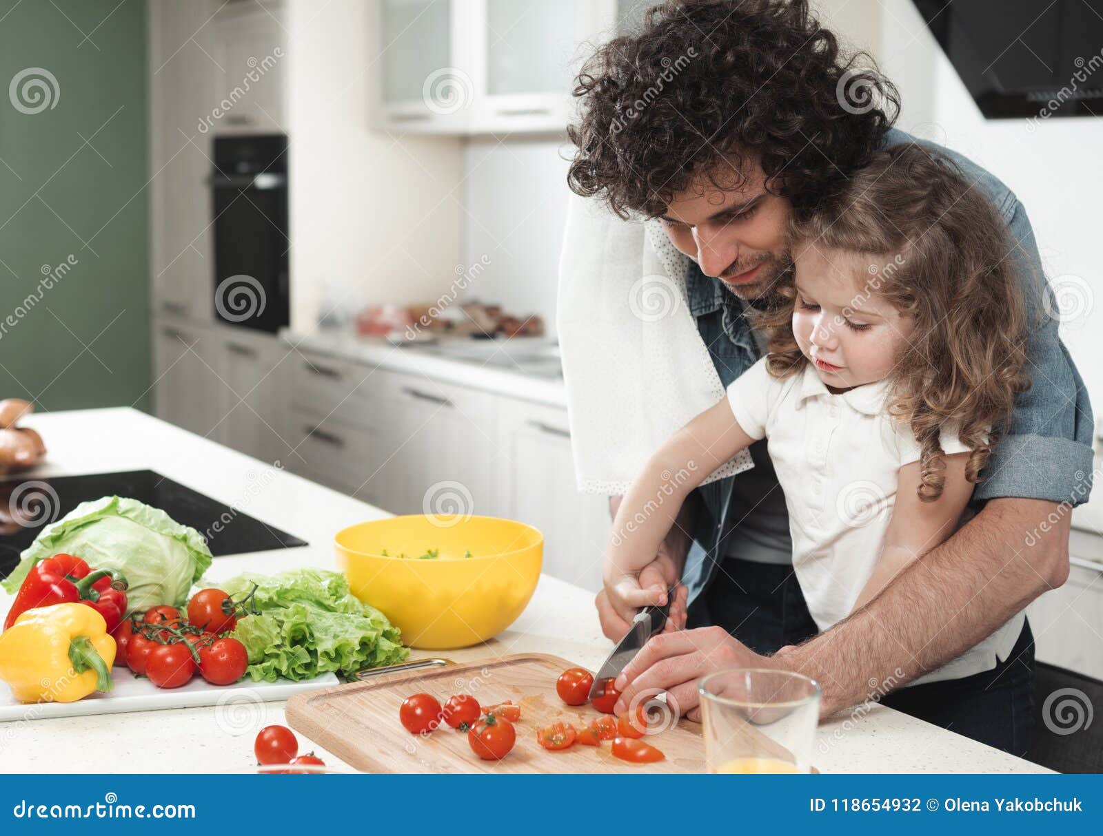 Cheerful Father and Daughter Making Salad in Kitchen Stock Photo ...