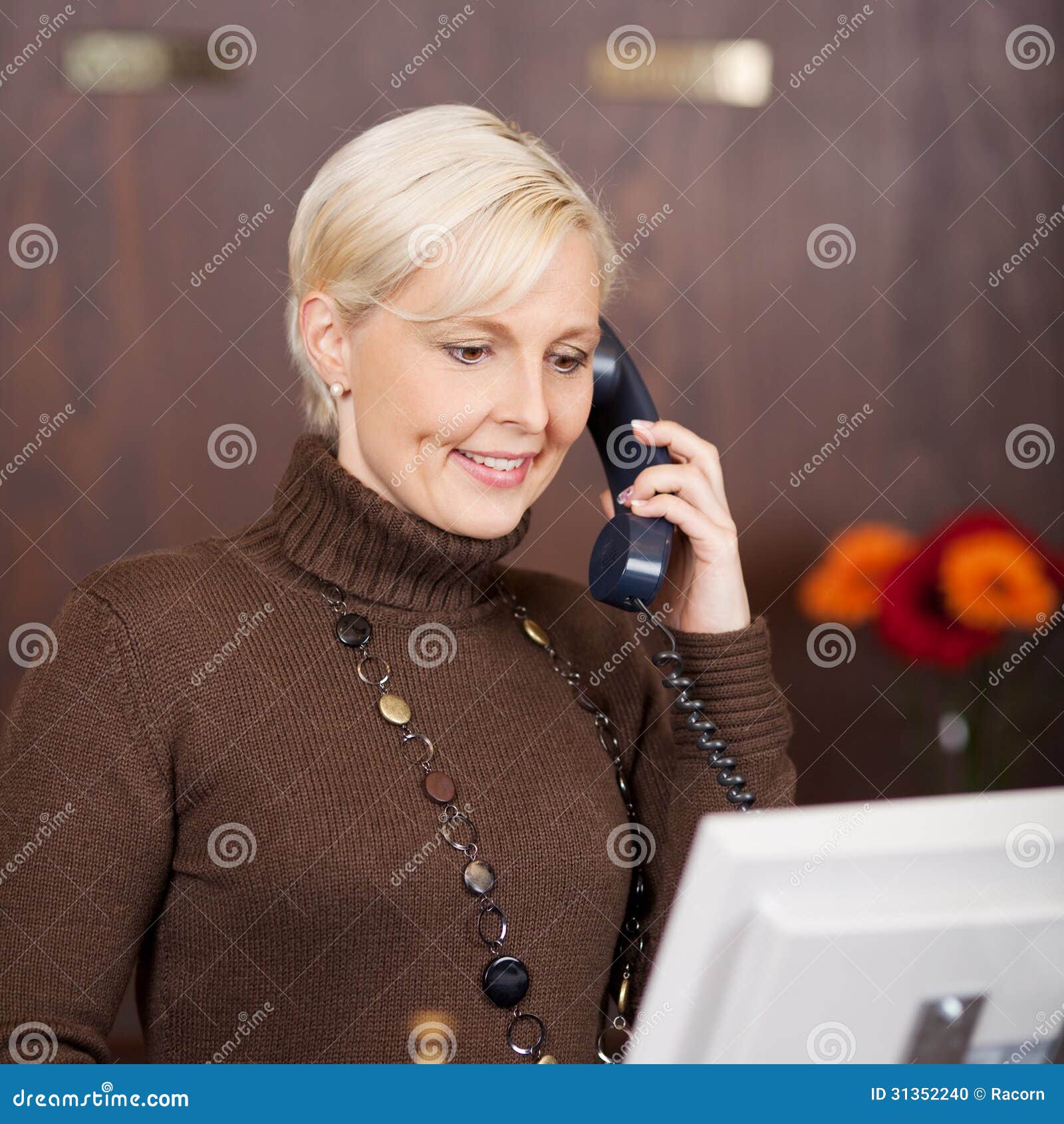 Cheerful Female Receptionist Using Telephone Stock Photo Image of