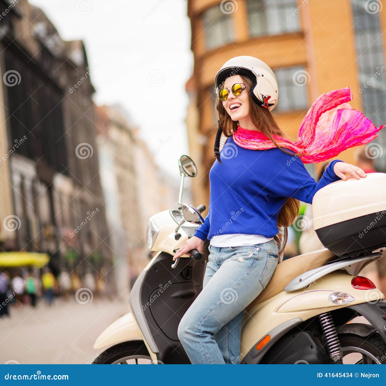 girls driving scooty