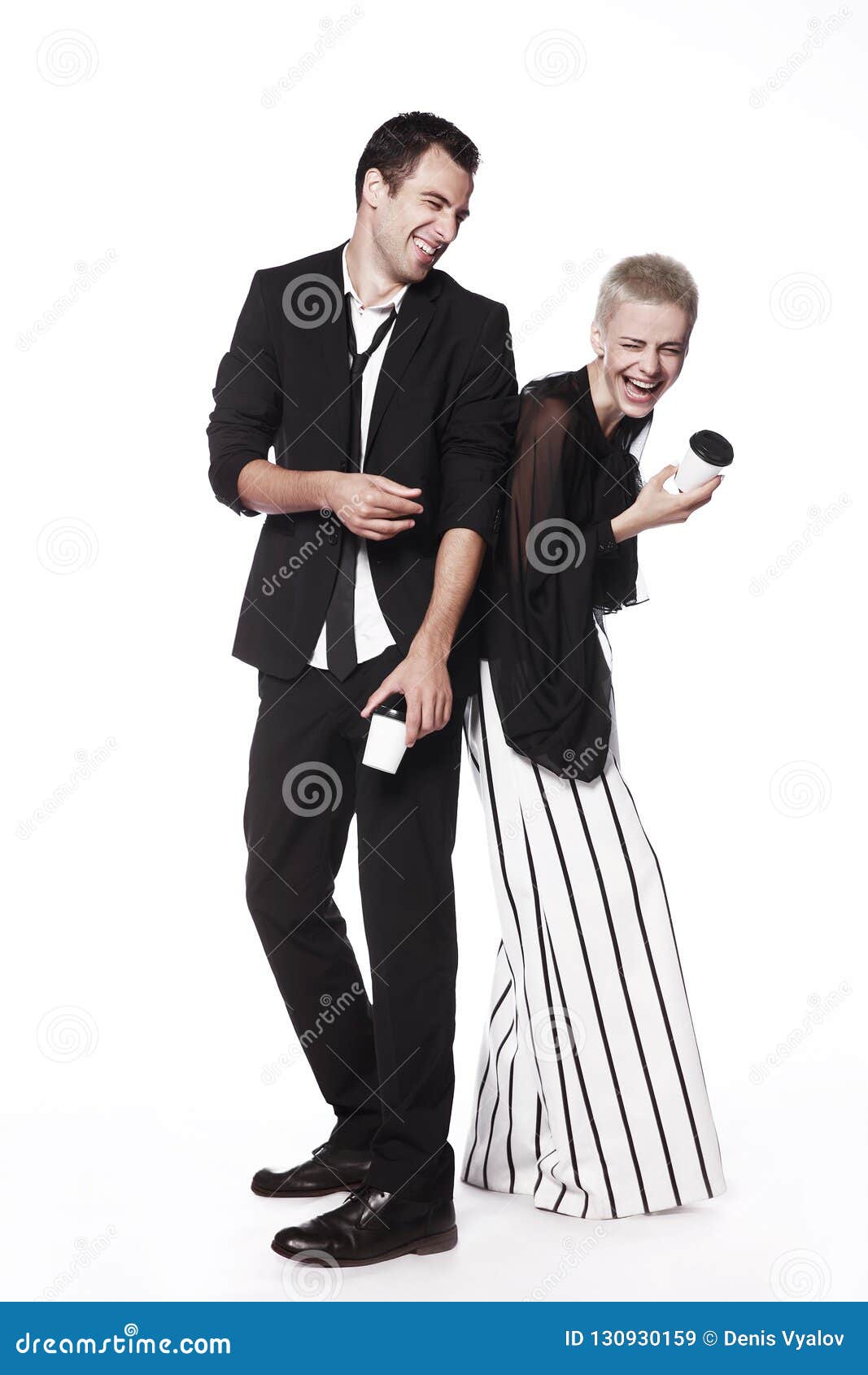 Cheerful Guy In A Black Suit And A Girl On A White Background Playful 