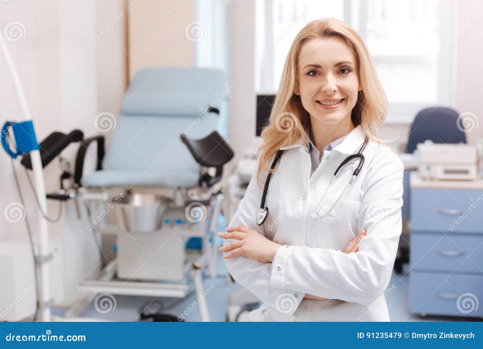 cheerful gynecologist waiting for the next patient in the cabinet